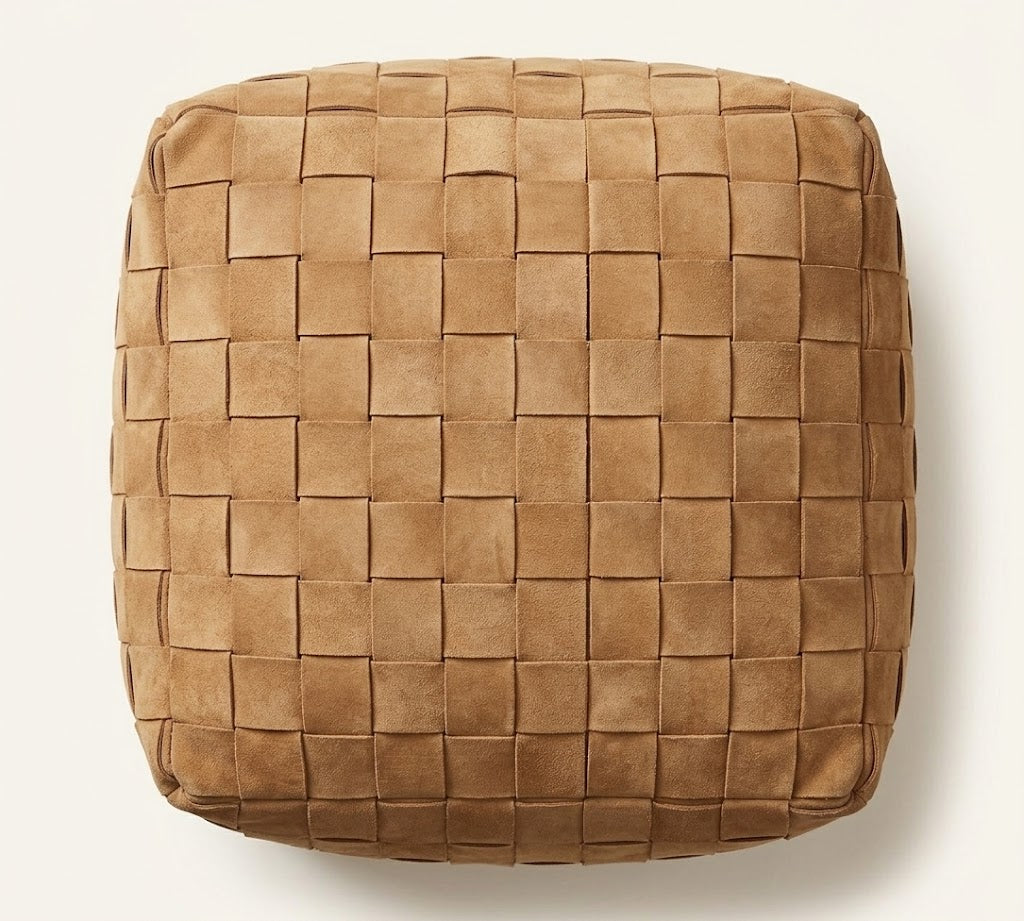 A square woven pouf or ottoman in a warm tan-brown leather-like material, photographed from directly above on a light neutral background.