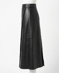 A black leather midi skirt with a matching belt and silver buckle, displayed on a white mannequin against a plain white background.