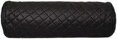 Black quilted cylindrical pillow