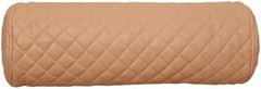 A cylindrical bolster pillow in a light tan or beige color, featuring a diamond-quilted pattern on a plain white background.