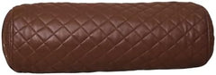A brown quilted cylindrical bolster pillow, shown against a plain white background.