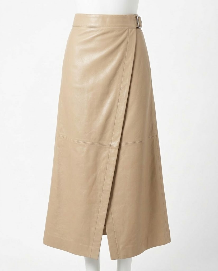 A beige leather wrap midi skirt with a matching belt, displayed on a white mannequin against a plain white background.