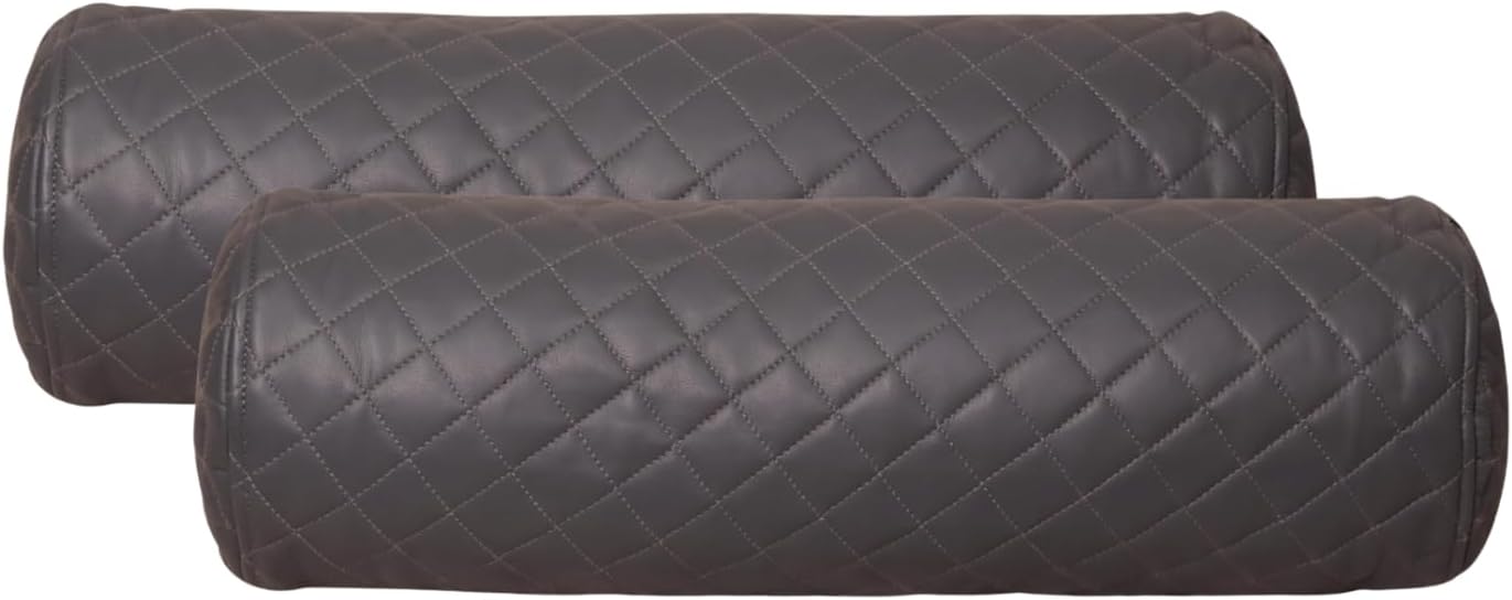 Two dark gray quilted cylindrical bolster pillows stacked on a white background.