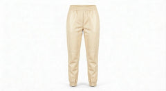 A pair of beige leather jogger pants with an elastic waistband and tapered legs, shown against a plain white background.