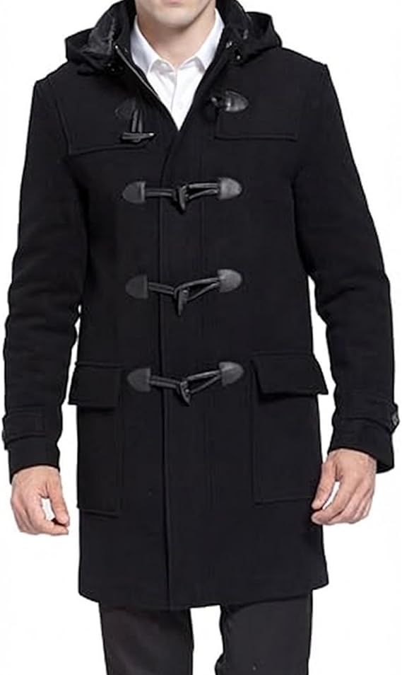 A man wearing a black hooded duffle coat with toggle closures over a white collared shirt, shown against a plain white background.
