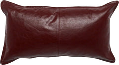 A rectangular leather lumbar pillow in a deep burgundy red color, shown against a plain white background.
