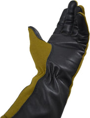 A single long protective glove shown on a white background, with a black leather-like back and fingers and a mustard yellow fabric palm and cuff lining.
