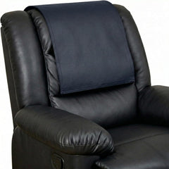 A dark navy blue fabric chair cushion or backrest pad shown fitted over the headrest area of a black leather recliner chair against a plain white background.