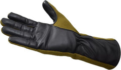 Black leather glove with green lining on a white background