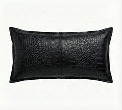 A rectangular black -crocodile leather lumbar pillow with a glossy textured finish, shown against a plain white background.