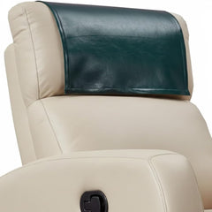A close-up of a beige leather recliner chair with a dark green faux-leather headrest cover or pillow insert attached across the top of the headrest.