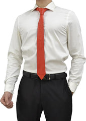 A man wearing a white long-sleeve dress shirt, a bright red tie, a black belt, and black trousers, shown from the neck down against a plain white background.