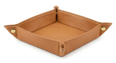 A square tan leather tray with gold snap-button corners, shown on a clean white background.