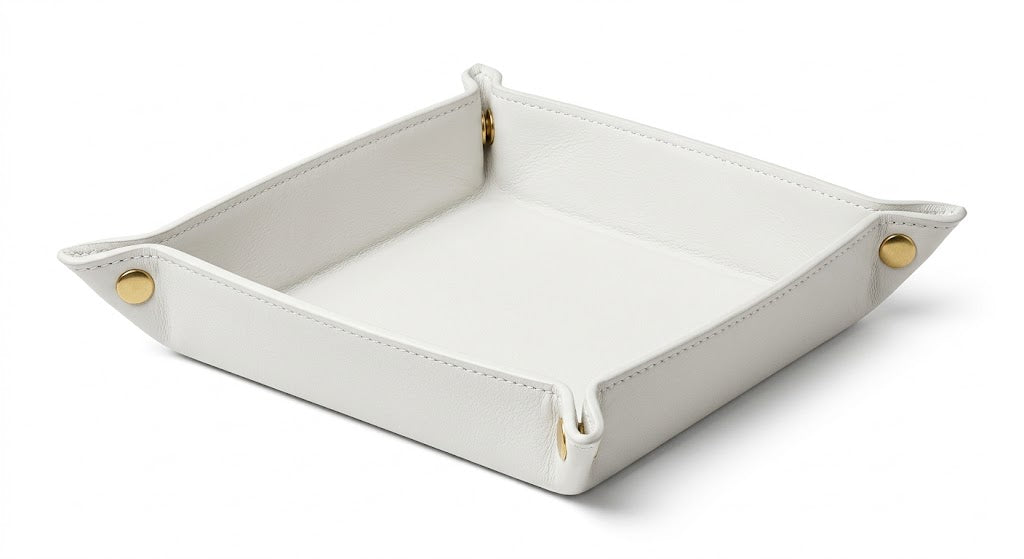 A square white leatherette tray with gold-tone metal snap buttons on the corners, shown on a clean white background.