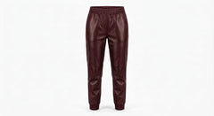 A pair of dark burgundy leather jogger pants with an elastic waistband and ribbed ankle cuffs, shown against a plain white background.