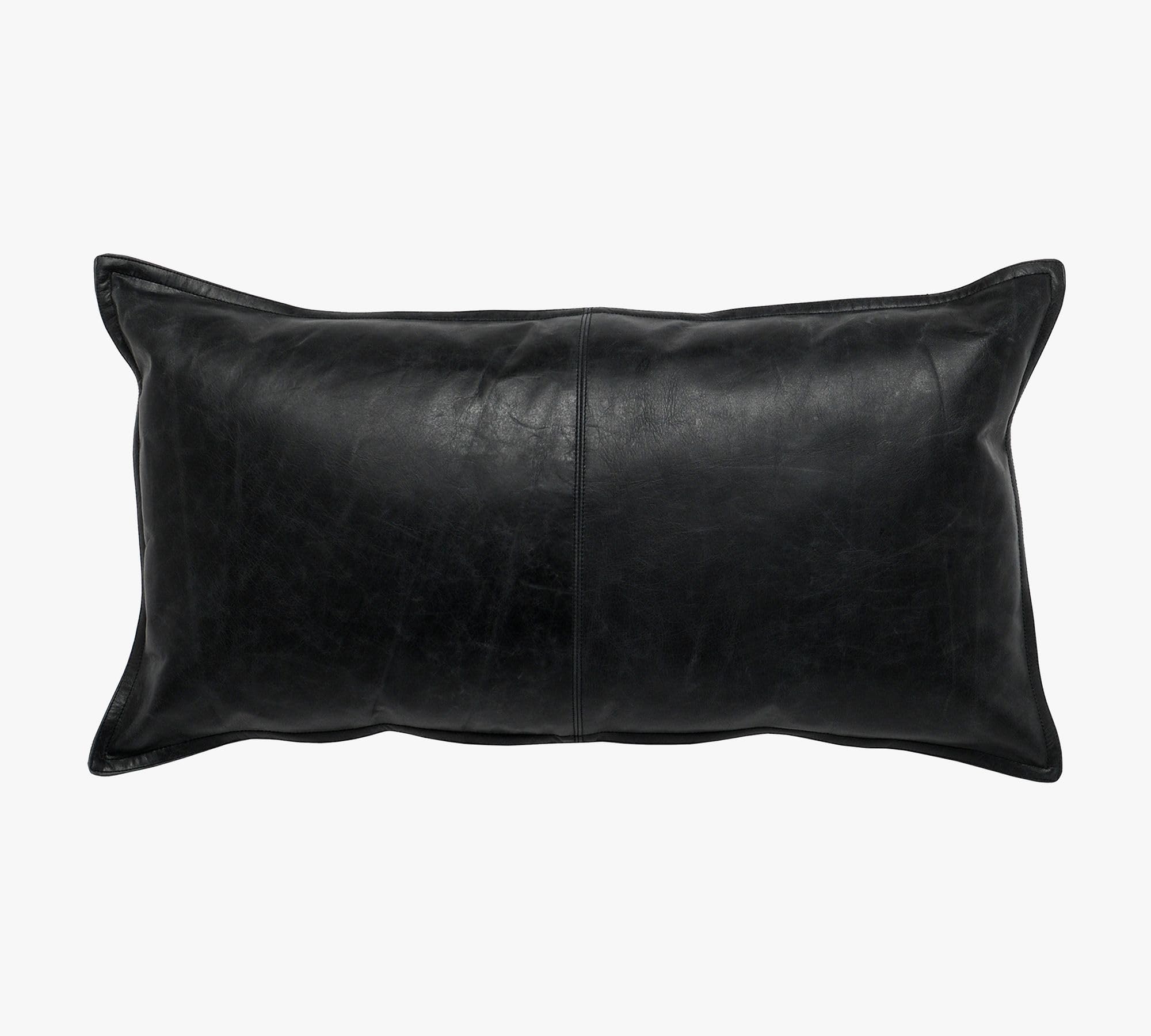 Black genuine leather lumbar pillow cover displaying a sleek matte texture on a studio background.