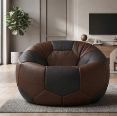 A modern round lounge chair with a soccer-ball-inspired panel design in brown and dark gray faux leather, placed on a gray rug in a contemporary living room.