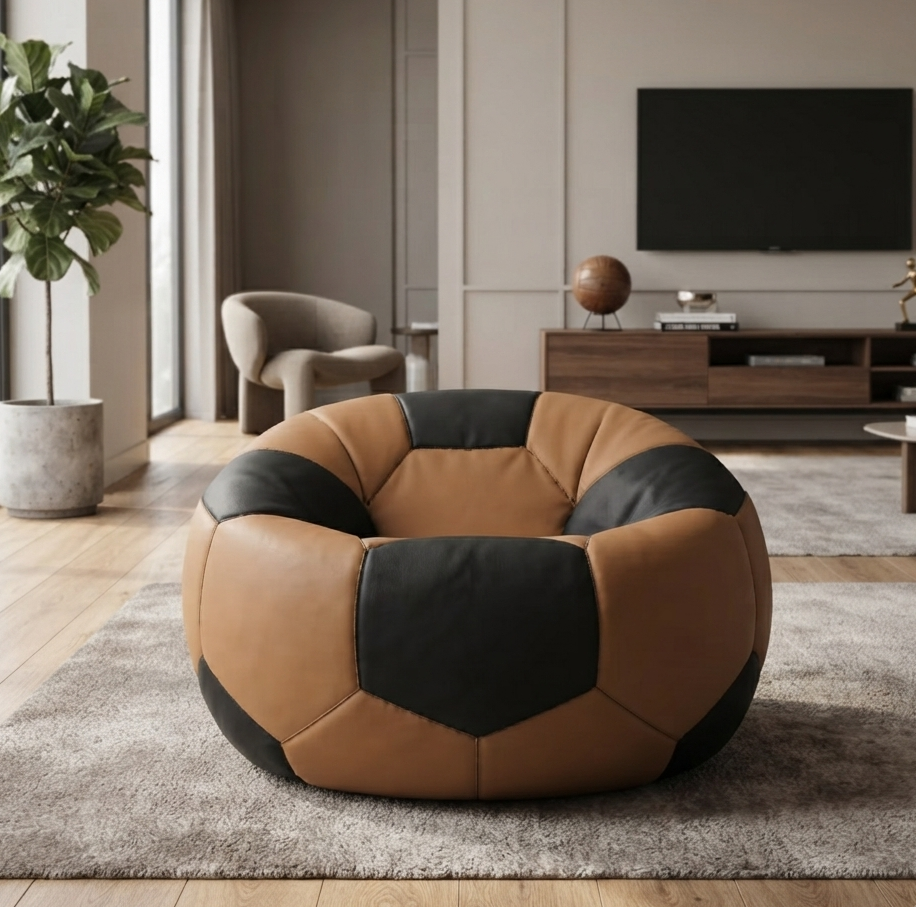 A round, soccer-ball-inspired lounge chair upholstered in tan and black panels, placed on a light gray rug in a modern living room setting.