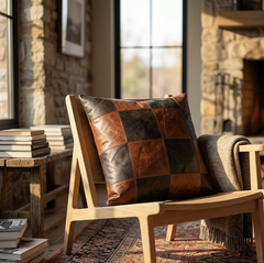 Moody golden hour Instagram ad shot of a brown checkered leather cushion on a modern lounge chair.