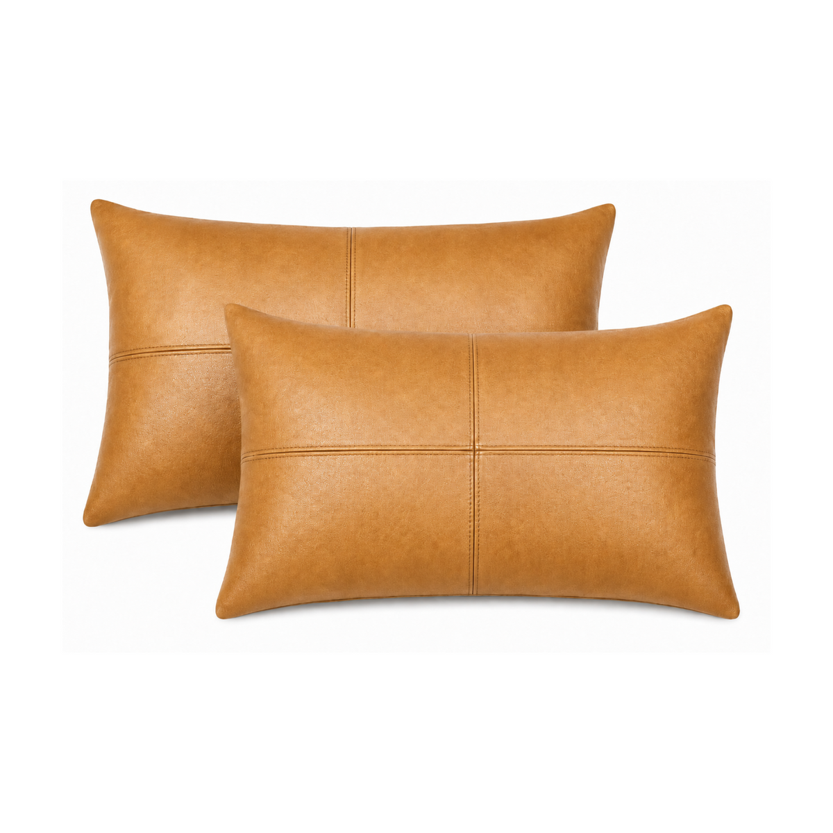 Two brown leather pillows on a white background
