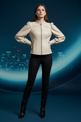 A woman modeling a structured cream-colored leather jacket with puffed balloon sleeves and a front zipper, paired with black pants and black ankle boots, set against a dark blue digital cityscape background.