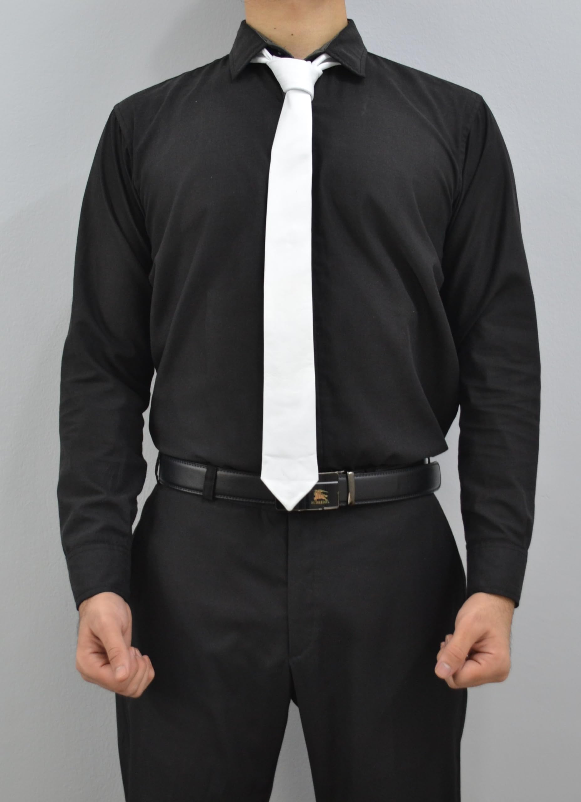 Close-up of genuine lamb leather texture on a white men's necktie