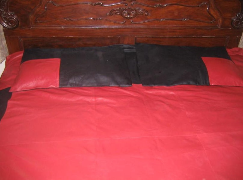 Red And Black Leather Bed Sheet With Two Pillows